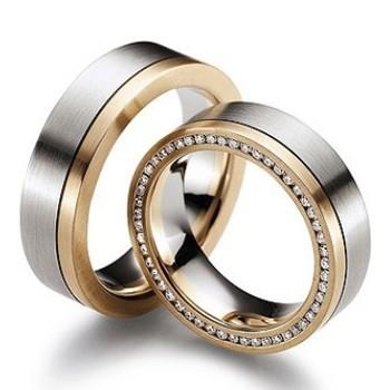 China Classic Men's Titanium Jewelry With IP Gold Plated Zircon Titanium Wedding Rings for sale