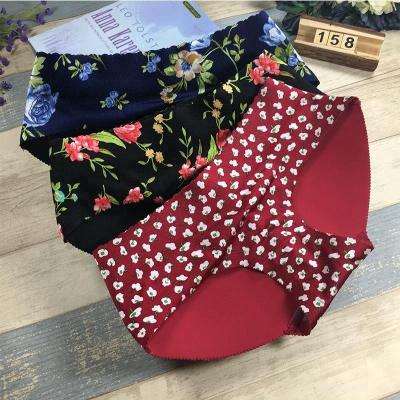 China Lady Printing Antibacterial Butt-Lift 8 Colors Lift Waist Cotton Stockings Disposable Paddeds Panties for sale