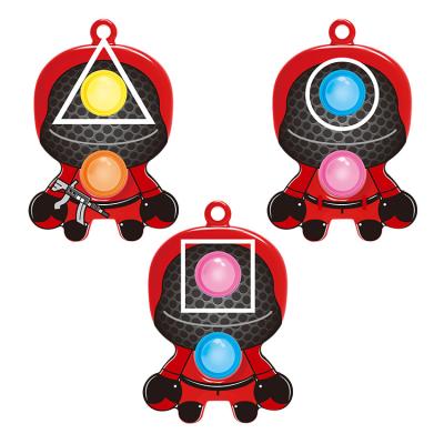 China Hot Selling TPR Squid Game Rodent Pioneer Key Finger Bubble Music Decompression Pendant Toy for sale