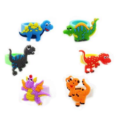 China Eco-friendly PVC Silicone Dinosaur Ring Dinosaur Party Favors Kids Birthday Party Favors Ring Party Supplies for sale