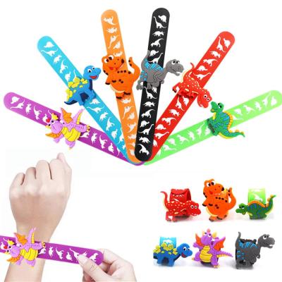 China Eco-friendly Silicone Dinosaur Slap Bracelet Dinosaur Gifts Wristband Birthday Party Gifts For Kids Toys for sale