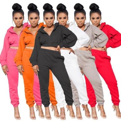 China Solid color women's breathable zipper hoodie hot sale new style long sleeve two piece sweatpants suits loose sports sexy two stacking pants for sale