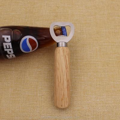 China Sustainable Free Sample Promotion White Handle Beech Opener Wooden Bottle Openers for sale