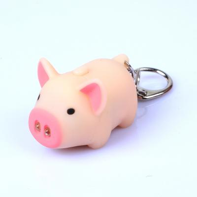 China Pig Key Chain Cartoon LED Pig Mini Sounding Key Chain Light The Creative Gift for sale