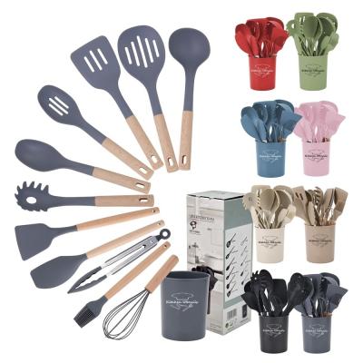 Cina utensili da cucina in silicone set di 12 pezzi utensili da cucina con maniglie di legno utensili in vendita