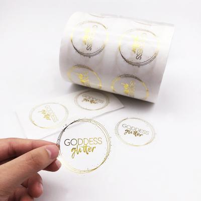 China Waterproof Customized Adhesive Printing Gloss Logo Product Clear Gold Foil Around Roll Label Sticker for sale