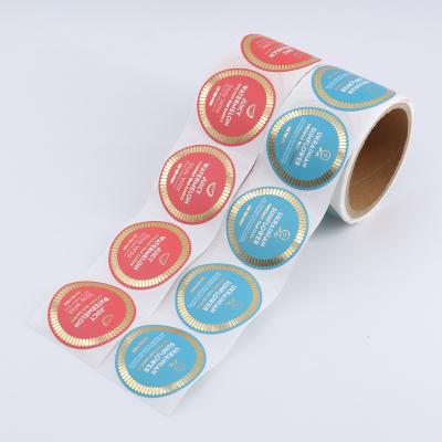 China Waterproof Custom Business Round Printing Gold Foil Vinyl Sticker Logo Packaging Label Roll for sale