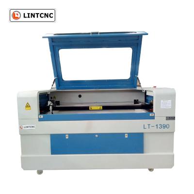 China Hot Sale Co2 Laser Cutting Machine 1390 For Cutting Fabric Leather Acrylic for sale