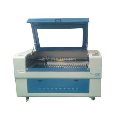 China Co2 Laser Engraving Cutting Machine Timberland Boots Laser Engraving Machine for sale