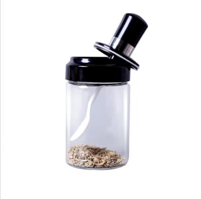 China Freshness Preservation Storage Jars Set Kitchen Glass Jars With Spoon Black Glass Kitchen Storage Jar Seasoning Bottle for sale