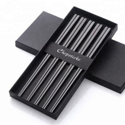 China Disposable Chinese Stainless Steel Rose Black Gold Rainbow Chopsticks With Box for sale