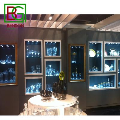 China Shopping Mall Luxury Fancy Glass Display Case With Light Wall Showcase High End Cabinet Design Glass Display Case for sale