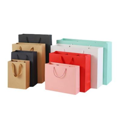 China Recyclable Custom Gift Boutique Women's Clothing Gift Wrapping Bag Christmas Dollars Print Logo Gift Paper Bag for sale