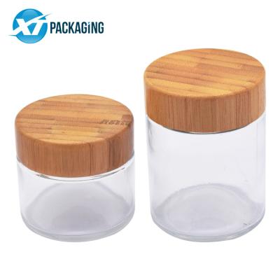 China 4oz 1/8th Child Proof Flower Bottle Real Cr Air Bamboo Lid Glass Bamboo Wooden Lid 2 Jar Lid 2 Jar Logo Bottles Viable Stocked Custom for sale