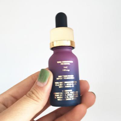 China White and Gold 30ml 4oz Cosmetic Opaque Purple Dropper Bottle Glass With Measurement Markings for sale