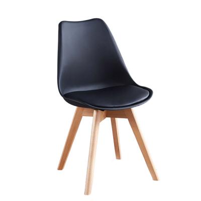 China 2023 Newest Modern Simple Plastic Office Dining Chair PU Wooden Legs Chair Dining Restaurant Event for sale