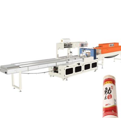 China Automatic Food Heat Shrink Tunnel Wrapping Machine Plastic Packaging Equipment For Book Magazine for sale