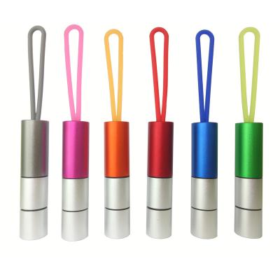 China Promotion Gifts Factory Price Aluminum Mini Multifunctional Key Chain Led Loop Torch Light With Silicone Rope And Pill Box for sale