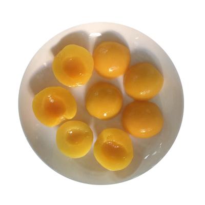 China Canned yellow peach canned in heavy halves/light syrup 425g in juice for sale