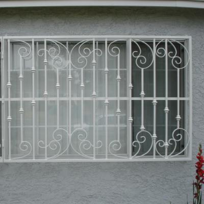 China Modern High Quality Powder Coated Interior Wrought Iron Window Grill Designs For Security for sale