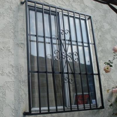 China Fixed Steel Frame Hardware And Fixed Open Style Wrought Iron Window Grill Designs for sale