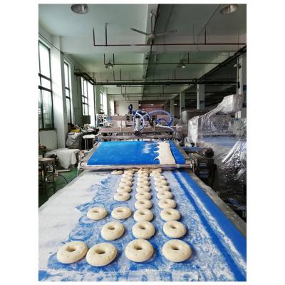 China Máquina de fabricação de donuts de alta velocidade para a indústria alimentar à venda