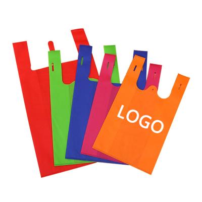 China 100% Eco-friendly Custom Logos Printed Eco Friendly Non Woven Vest Shopping Bags for sale