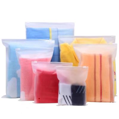 China Recyclable Wholesale Custom Logo Frosted Plastic Bag Clothes Self Sealing Bag Clothing Packaging Frosted Zipper Bags Printed Logo for sale