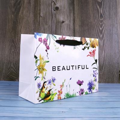 China Wholesale Recyclable Printed Flat Custom Colorful Clothing Craft Gift Luxury Shopping Paper Bag for sale