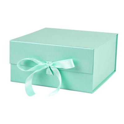 China Luxury Recycled Materials Packaging Boxes Gift Packaging With Ribbon Custom Cosmetics Gift Box for sale