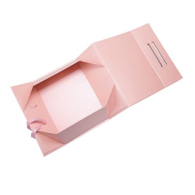 China Recycled materials wholesale luxury cute paper gift box big logo cardboard paper custom packaging box with ribbon for sale