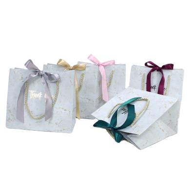 China Fashion Shopping Bags Biodegradable Chinese Importing Custom Paper Bag With Ribbon Handle for sale