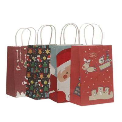 China Recyclable Christmas Paper Bags Packaging Waterproof Paper Bags With Handles for sale