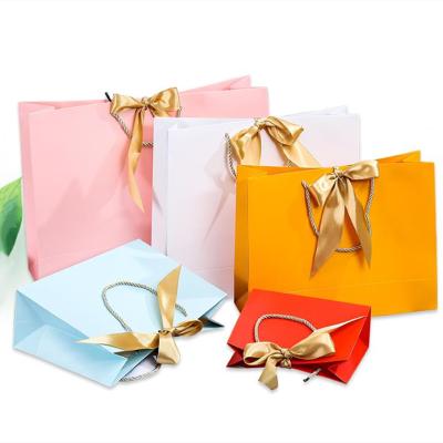 China Luxury Custom Logo Print Paper Shopping Bags Recyclable Excellent Quality For With Handle for sale