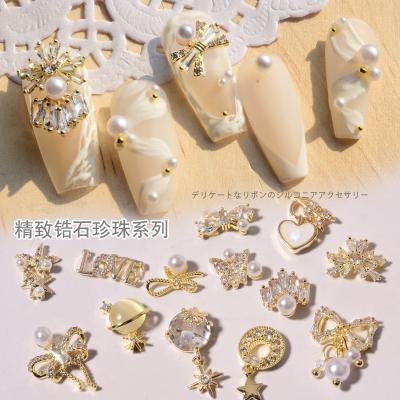 China Finger Decoration Zircon Bowknot Jewelry Gold Chain Pendant Bead Set Diamond Nail Jewelry Diamond Nail Decorations Accessories for sale