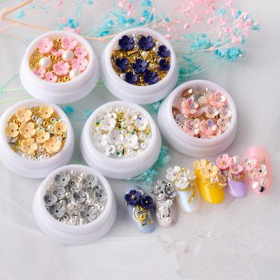 China Random Mixed Nail Art Accessories Beauty 3D Decoration Shell Flower Revet Rhinestones Nail 8 Trendy Designs for sale