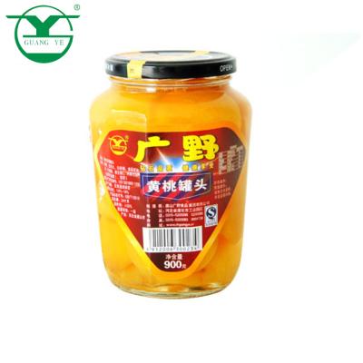 China 900g canned canned yellow peach in syrup preservation process canned yellow peaches halves for sale