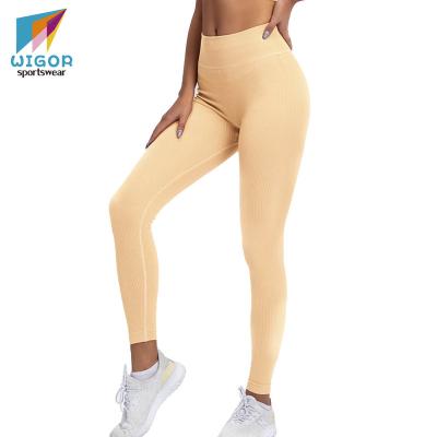 China Seamless Gym Women's Breathable Pants With Pocket Fitness Yoga Wear Plus Size Sports Tracksuit Yoga Gaiters For Women Tiktok Gaiters Yoga Pants for sale