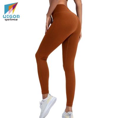 China Breathable Women Seamless Workout Sets Yoga Equipments Tummy Control High Waist Gaiters With Sports Bra Tracksuit Gym Clothes for sale