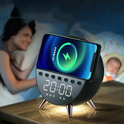 China Modern New Design All-in-one Speaker 15W Wireless Digital Alarm Clock Night Fill Light for sale