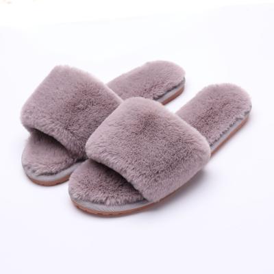 China Luxury Warm Fluffy Indoor Indoor Furry Faux Fur Slippers Fashion Trend Style Upper Slippers For Ladies for sale