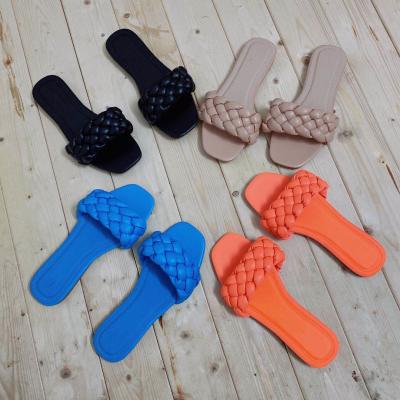 China 2021 Fashion Trend New Fashion Woven Flat Women's Summer Shoes Beach Ladies Slippers for sale