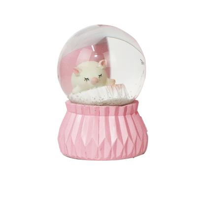 China Custom Europe resin 80mm snow globe kawaii pig water ball for sale