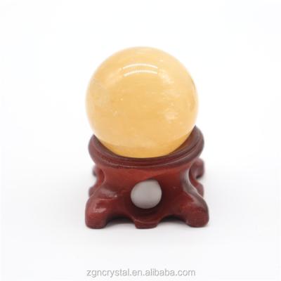 China China high quality healing stone yellow calcite ball for spiritual mediation for sale