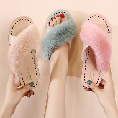 China Cushioning Korean women's fur use flat bottom fashion plush outer slippers autumn and winter version of warm cross women's shoes wholesale for sale