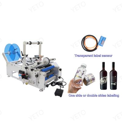 China Food Container Cosmetic One Side Front And Back Gluing Labelers Round Bottle Labeling Machine For Transparent Labels for sale