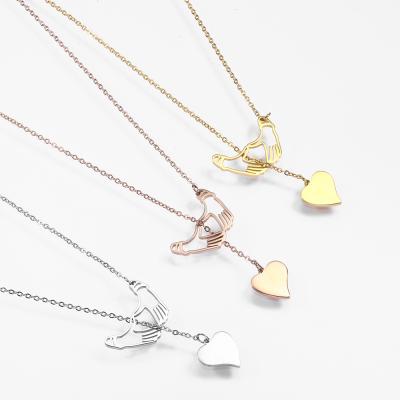 China New Classic 18-Karat Gold Plated Two Hand Simple Women's Sweater Chain Titanium Steel Hollow Out Hand Heart Necklace for sale