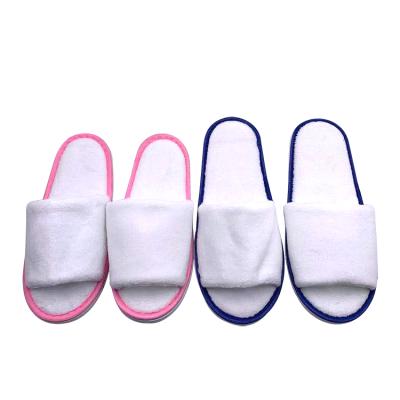 China Customized Soft And Comfortable Logo Coral Fleece Open Toe Hotel Spa Guests Slippers For Women Men for sale