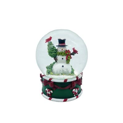 China Wholesale High Quality Home Resin Snowman Green Christmas Decoration Snow Globes Glass Water Ball for sale