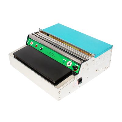 Cina Supermarket vegetable and fruit wrap film sealing and cutting machine in vendita